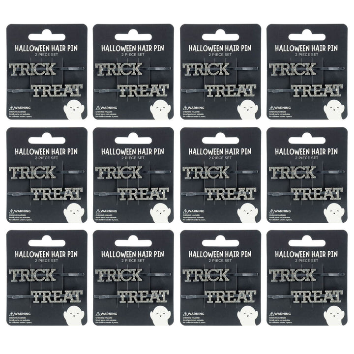 12 display cards of Halloween hair pins with 'Trick Treat' text on a white background