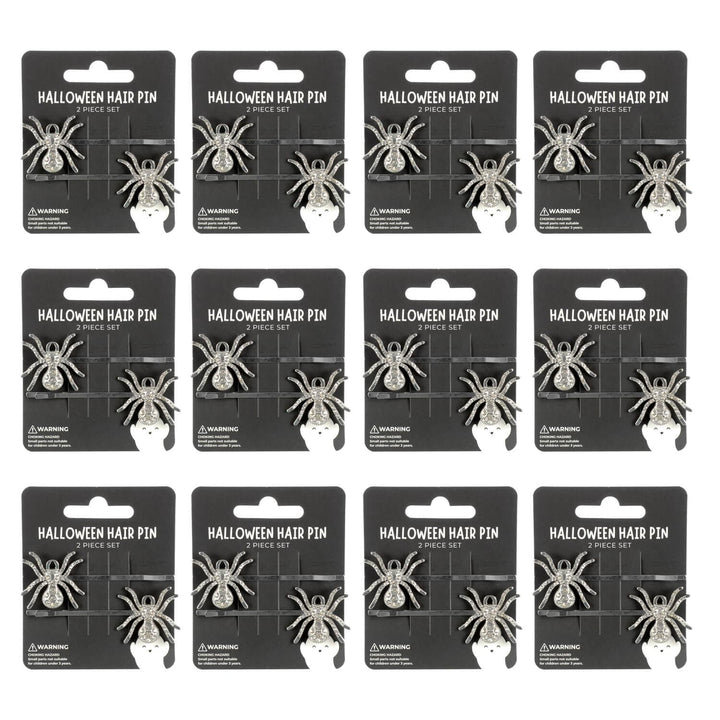 12 display cards with silver spider Halloween hair pins on a white background