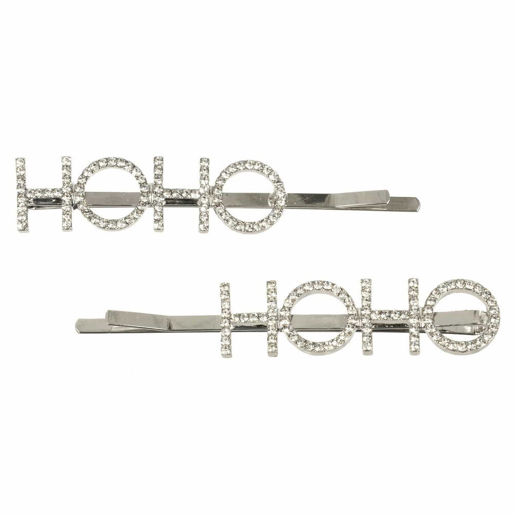 Two silver hair clips with 'HO HO' text on a white background