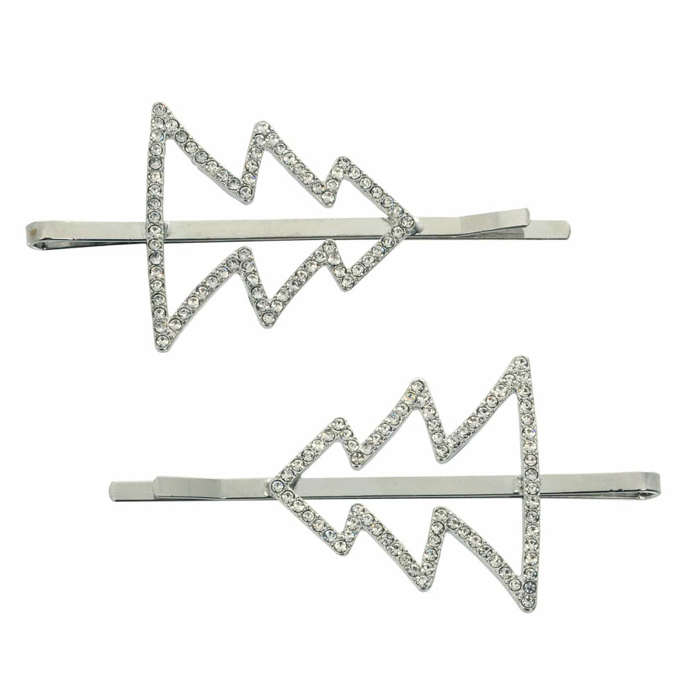 Set of 2 silver Christmas tree shape hair slides with sparkling diamante decoration on a white background