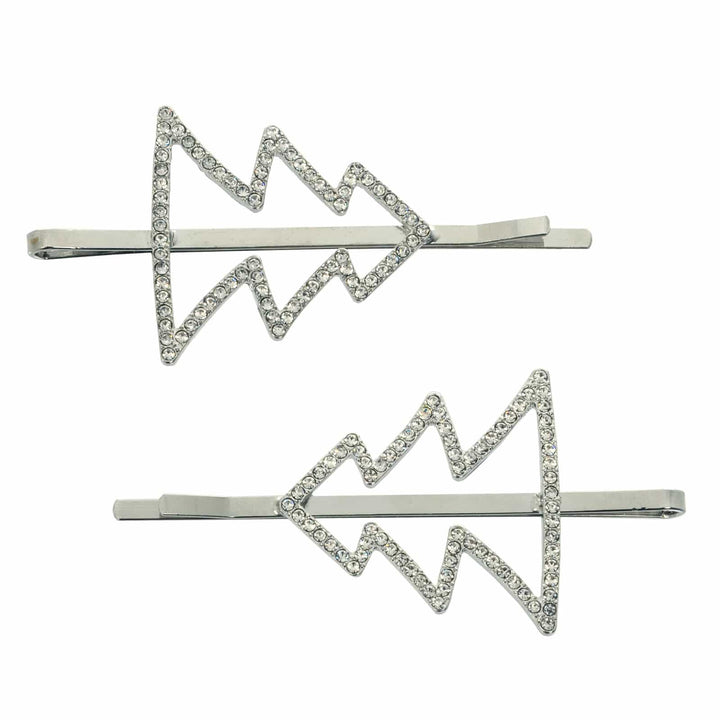 Set of 2 silver Christmas tree shape hair slides with sparkling diamante decoration on a white background