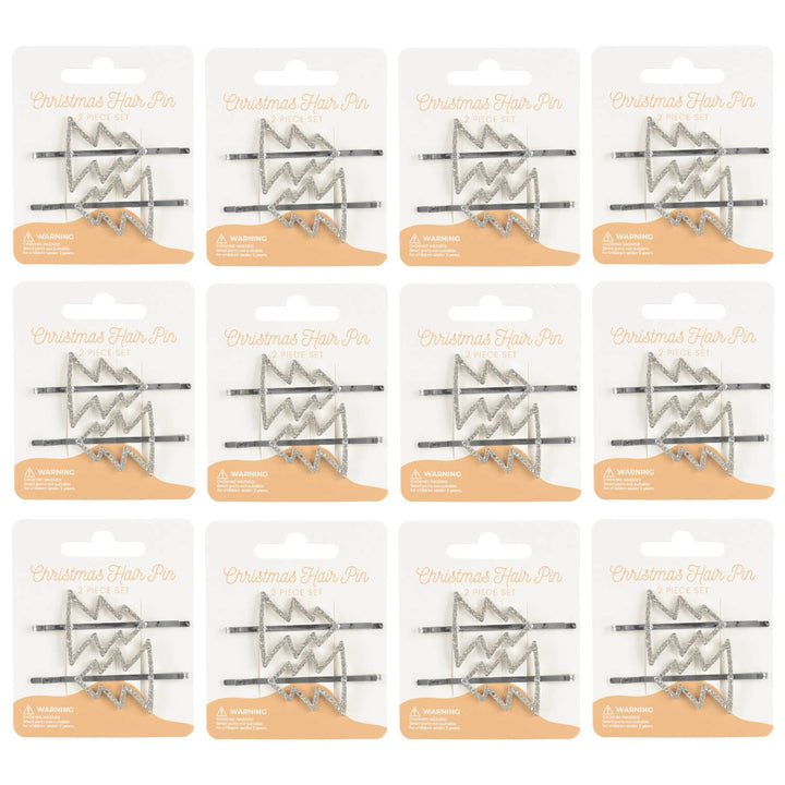 12 display cards of silver Christmas tree hair pins on a white background