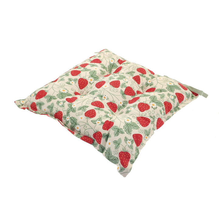 Square design chair cushion with strawberries pattern on a white background