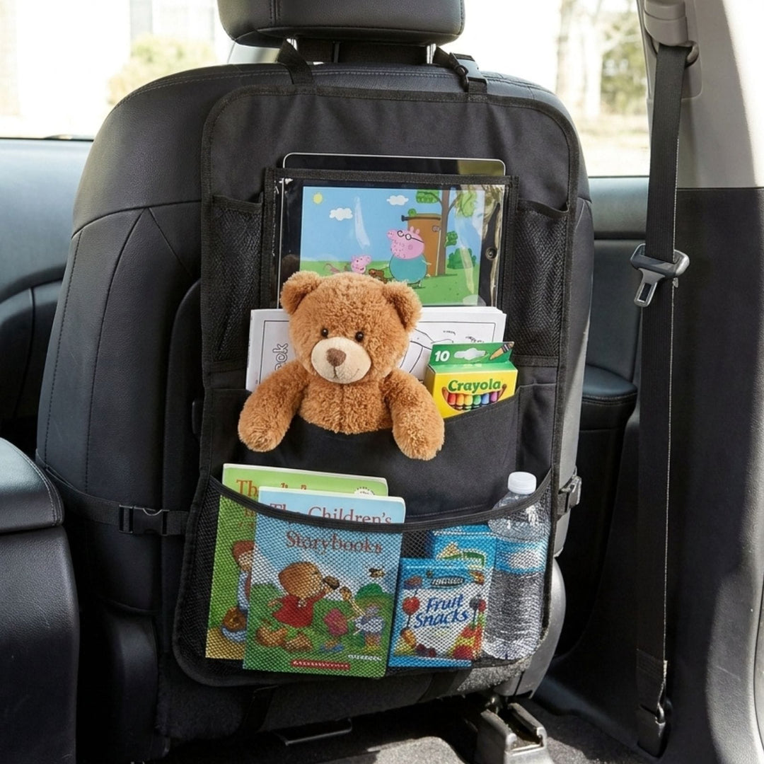 in car backseat organiser with kids crayons, snacks, eddy bear and table with peppa pig playing on screen