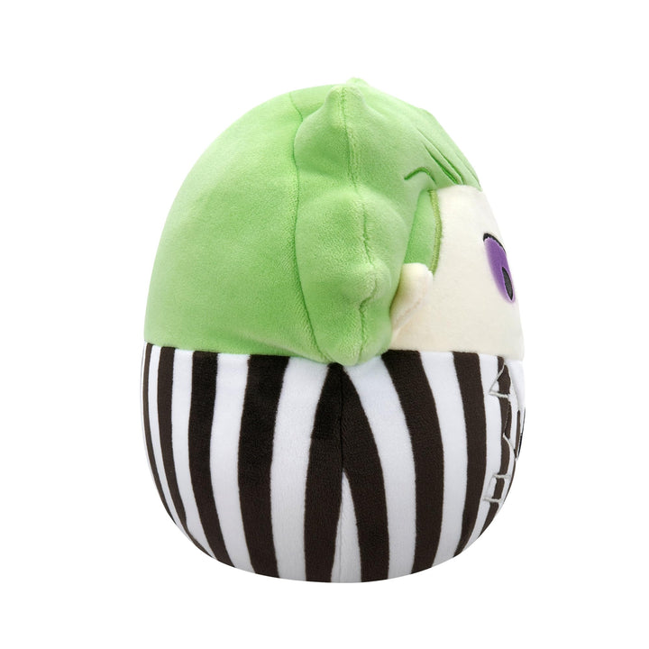 Plush toy with green top and black and white striped body on a white background