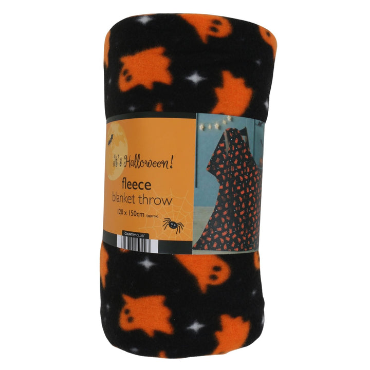 A rolled-up Halloween fleece blanket throw featuring a black background with orange ghosts and white stars, wrapped in a paper label that reads 'It's Halloween! fleece blanket throw'.