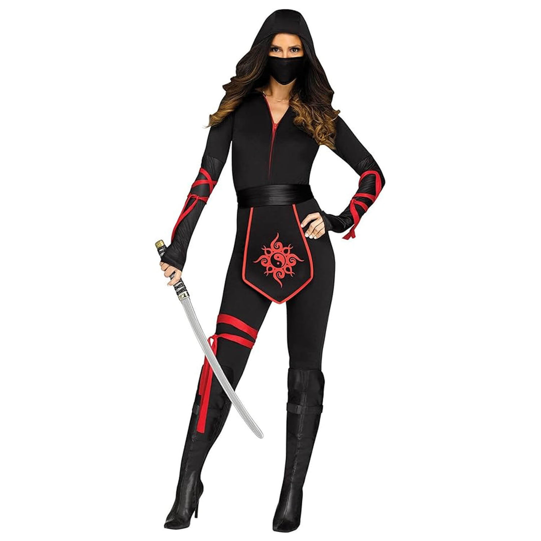 A woman modeling a black ninja-style costume with red trim and a red floral emblem on the front, wearing a black hood and face mask, and holding a toy sword against a plain white background.