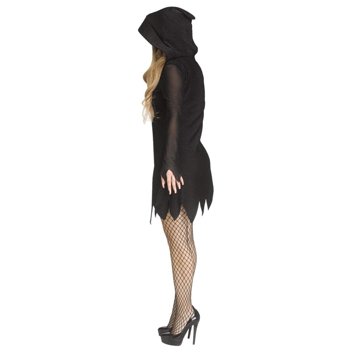 Woman in profile wearing a black hooded Halloween costume dress with fishnet stockings and black high heel shoes on a white background