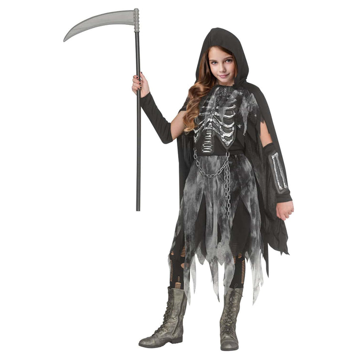A child wearing a grim reaper Halloween costume holding a toy scythe, photographed against a solid white background.