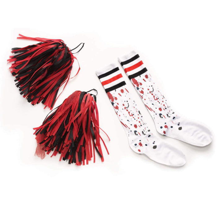 Pair of white socks with red and black tassels on a white background