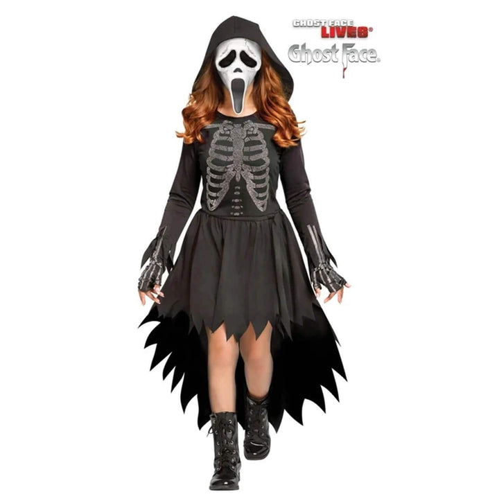 A girl wearing a Ghost Face Halloween costume with sparkling rhinestone skeleton detailing and white mask shown against a plain white background.