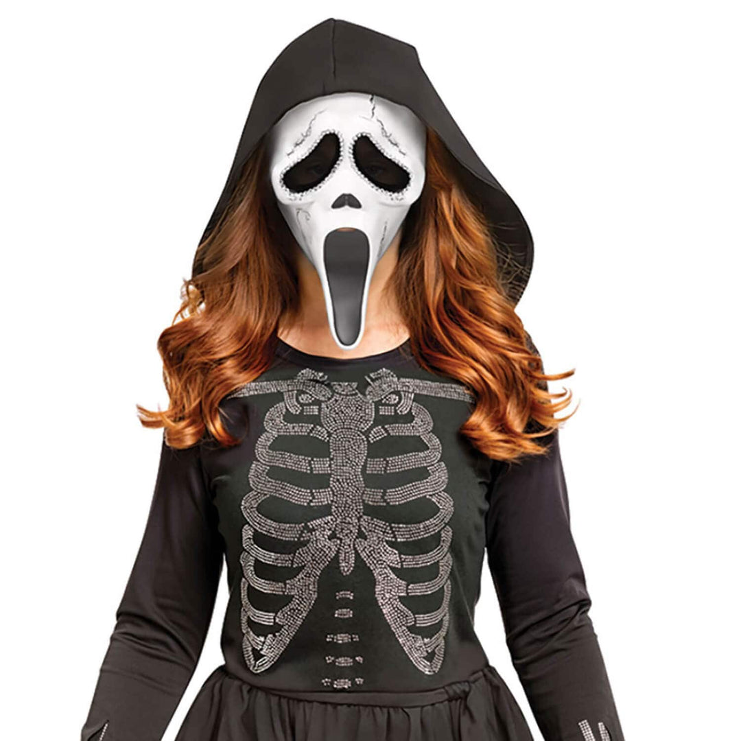 Close up of a White Ghost Face mask and skeleton bodice on a black hooded dress