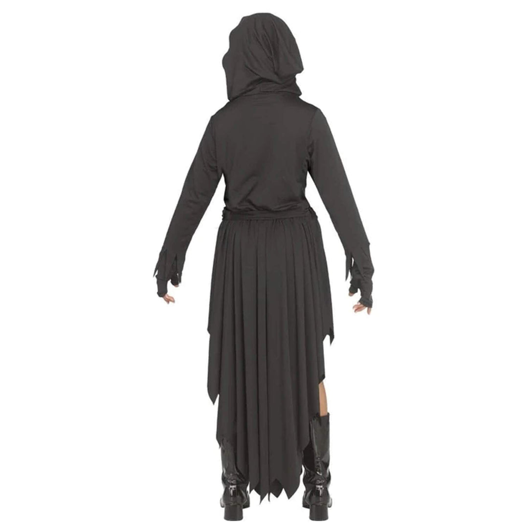 Back view of a girl wearing a long black hooded dress with shiny black boots on white background