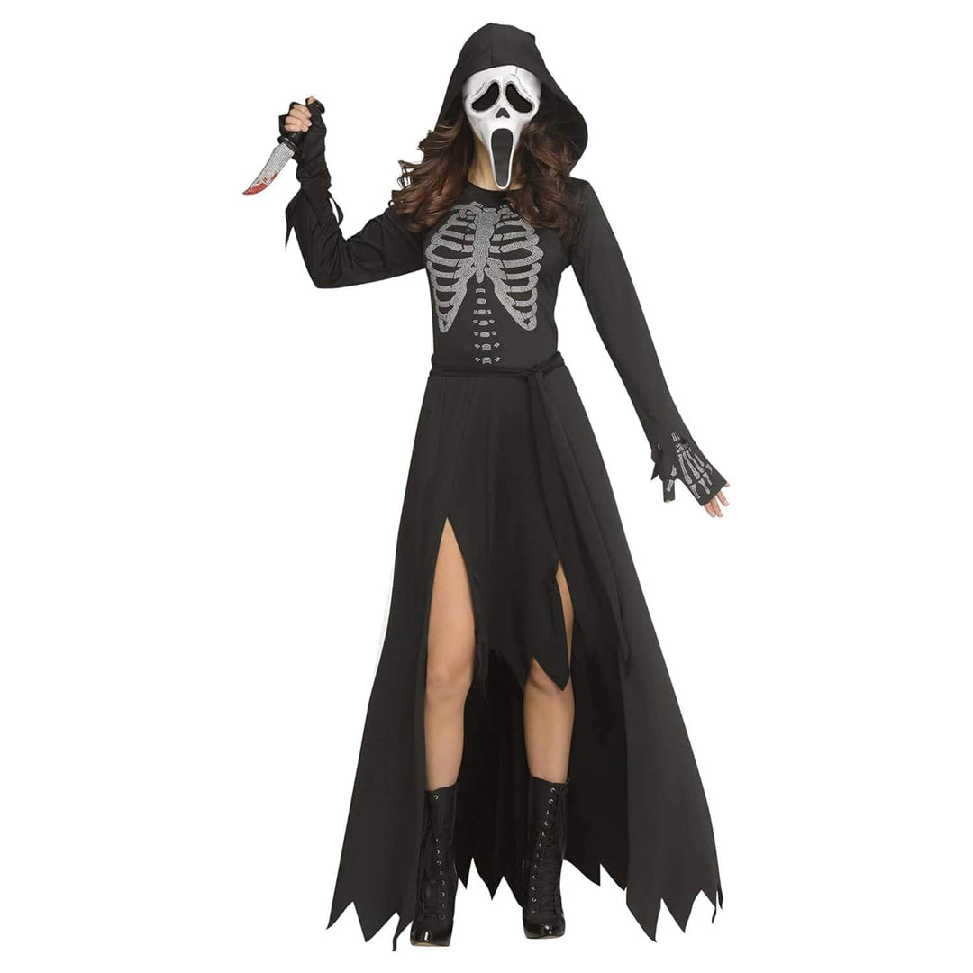 A woman modeling a long black hooded ghostface-style costume dress with a white skeleton chest print, black fingerless gloves, a black mask, and black lace-up boots against a plain white background.