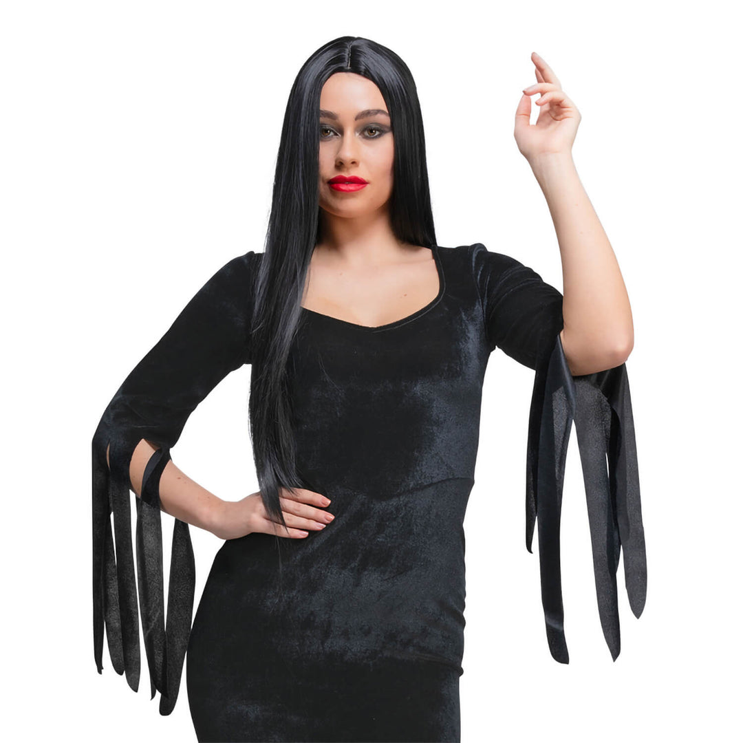 Person wearing a black dress with long black gloves and a wig on a white background