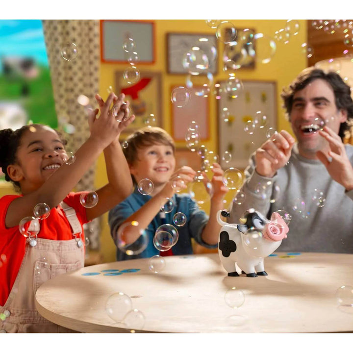 Family playing a game of Moo Moo Achoo with lots of bubbles