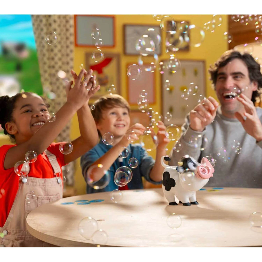 Family playing a game of Moo Moo Achoo with lots of bubbles