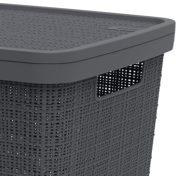 side view of handle with lid on woven laundry basket