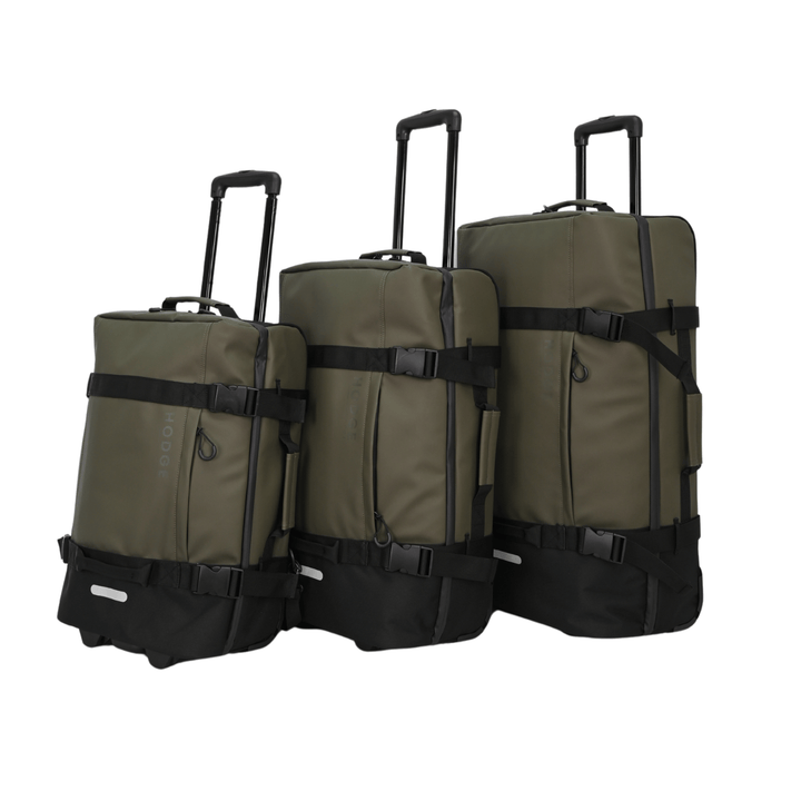 set of 3 suitcases from small to large resting together