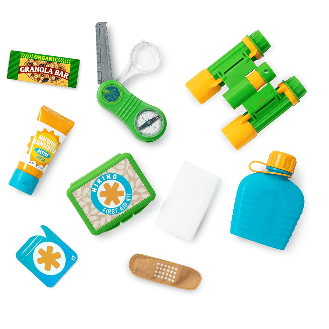pieces included are binoculars, drinking flask, sunscreen tube, granola bar, mlti took, first aid kit, plaster, wipes