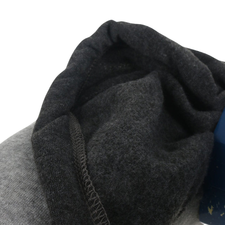 close up of fleece lining in hood on dark grey travel neck pillow