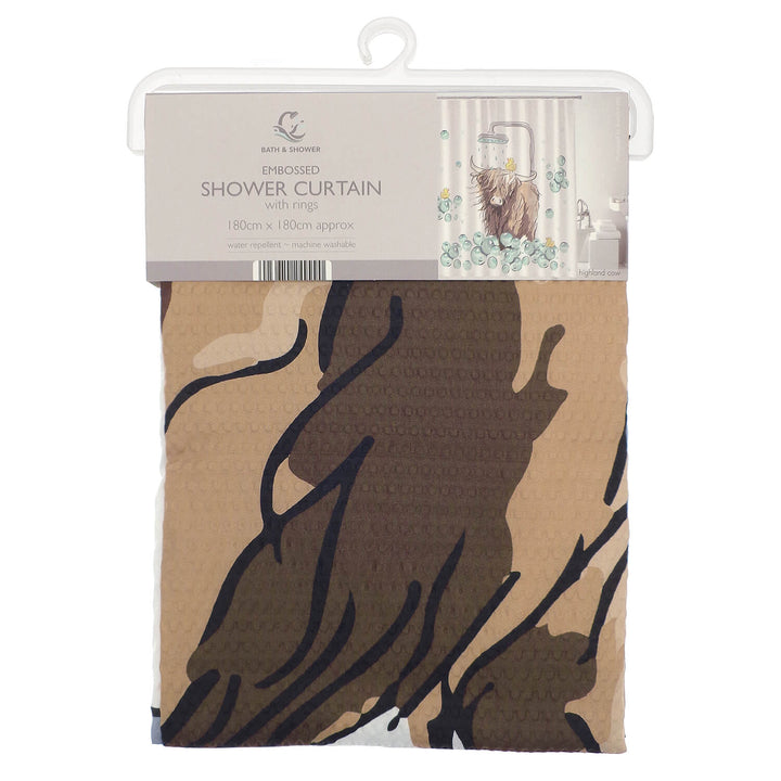 Embossed shower curtain with highland cow pattern in packaging
