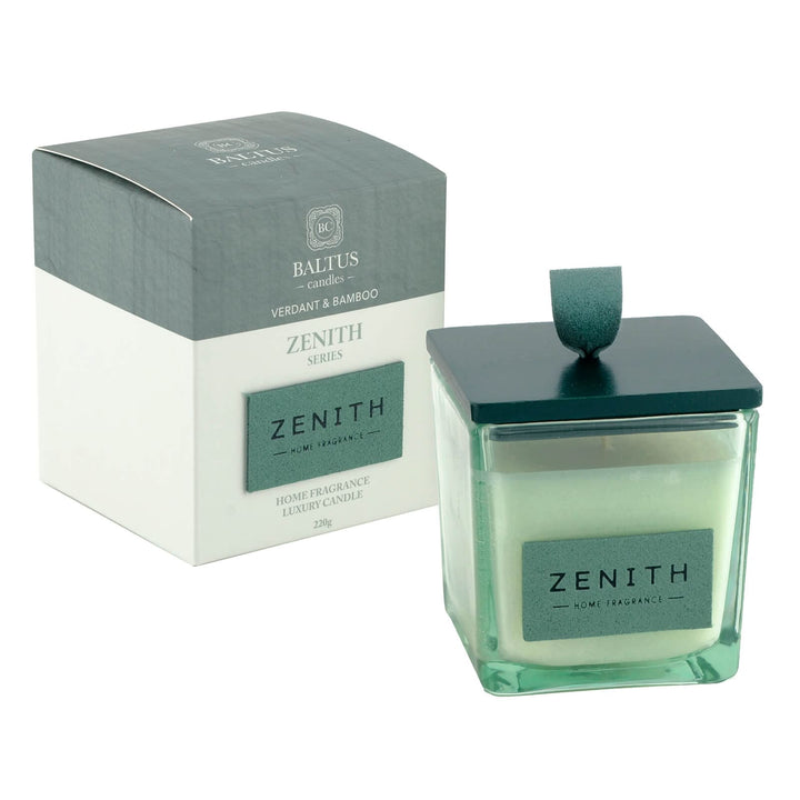 Green candle with lid and packaging labeled &