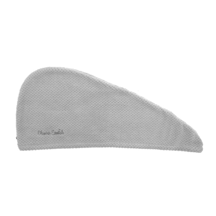 Grey hair drying turban with waffle texture laid flat on a white background