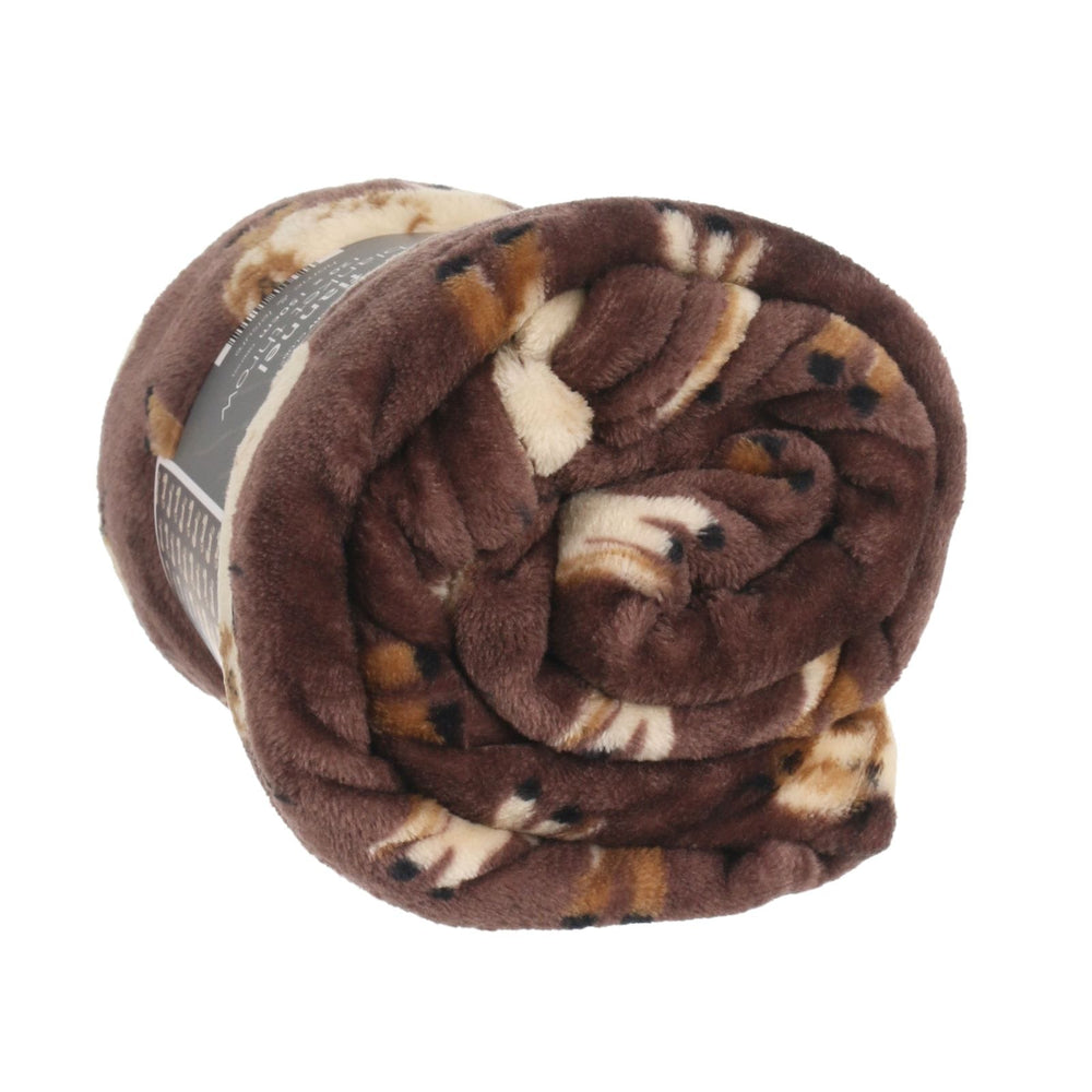 side view of flannel blanket rolled up on white background