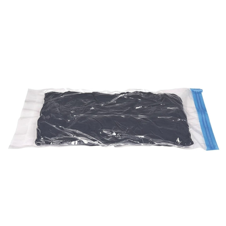 compression bag after being rolled highlighting compression design on white background