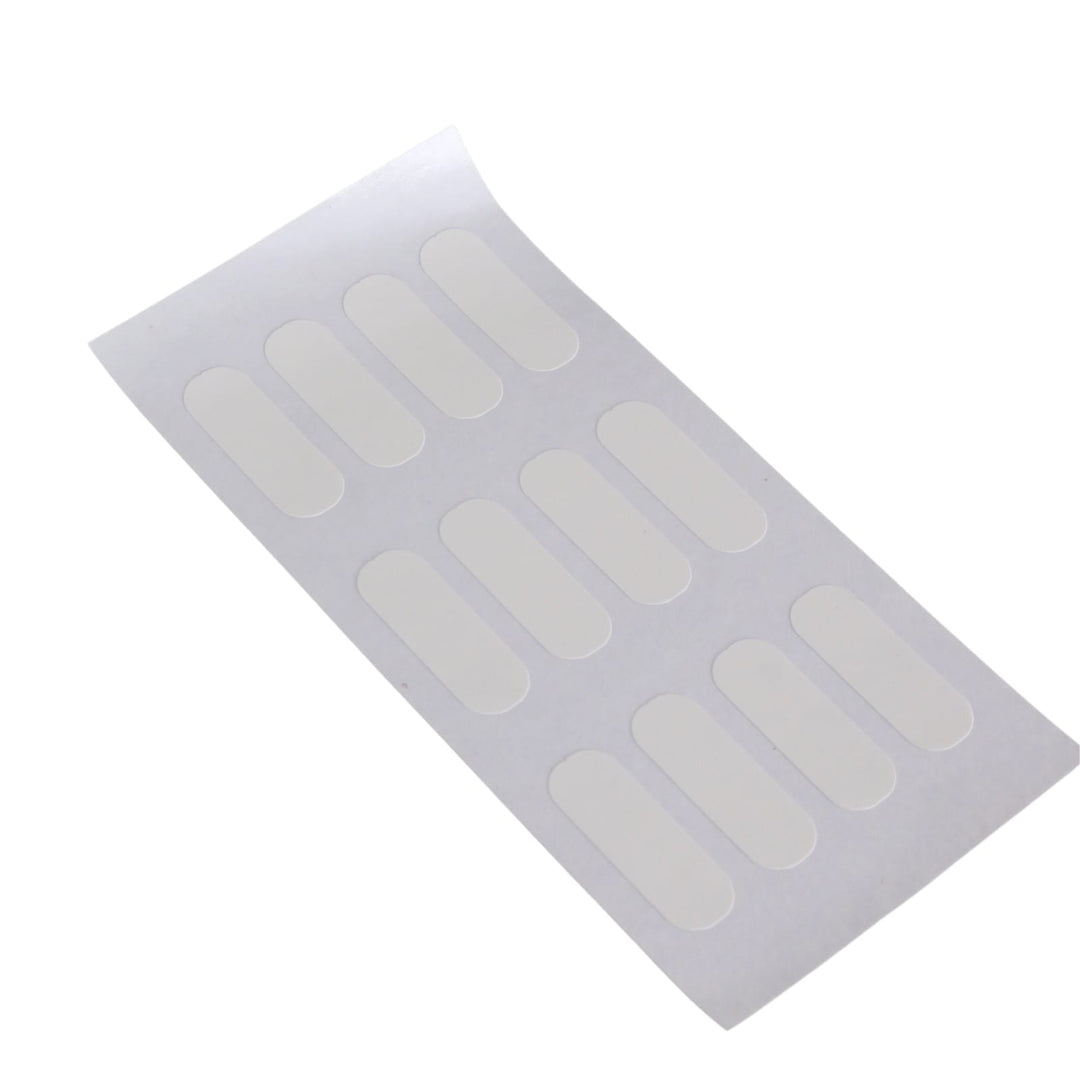 a sheet of 12 sticky tabs to personalise bottle contents on white background