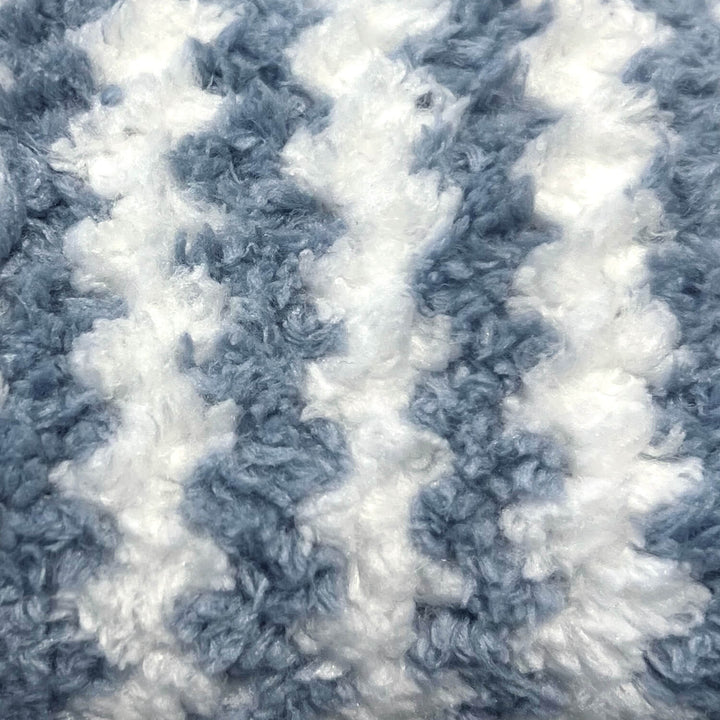 Close up of blue and white striped microfibre material