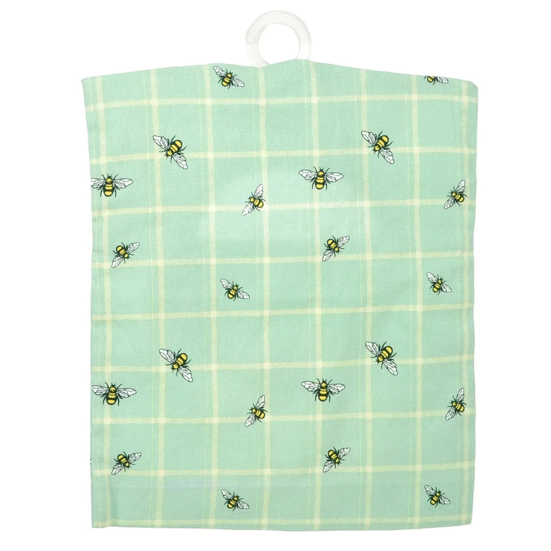 Back of a peg bag with bumblebees and green checked pattern