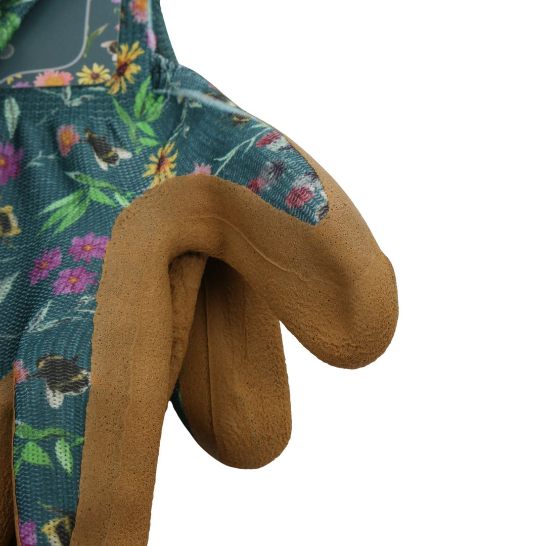 close up of rubber grips on multi purpose garden gloves