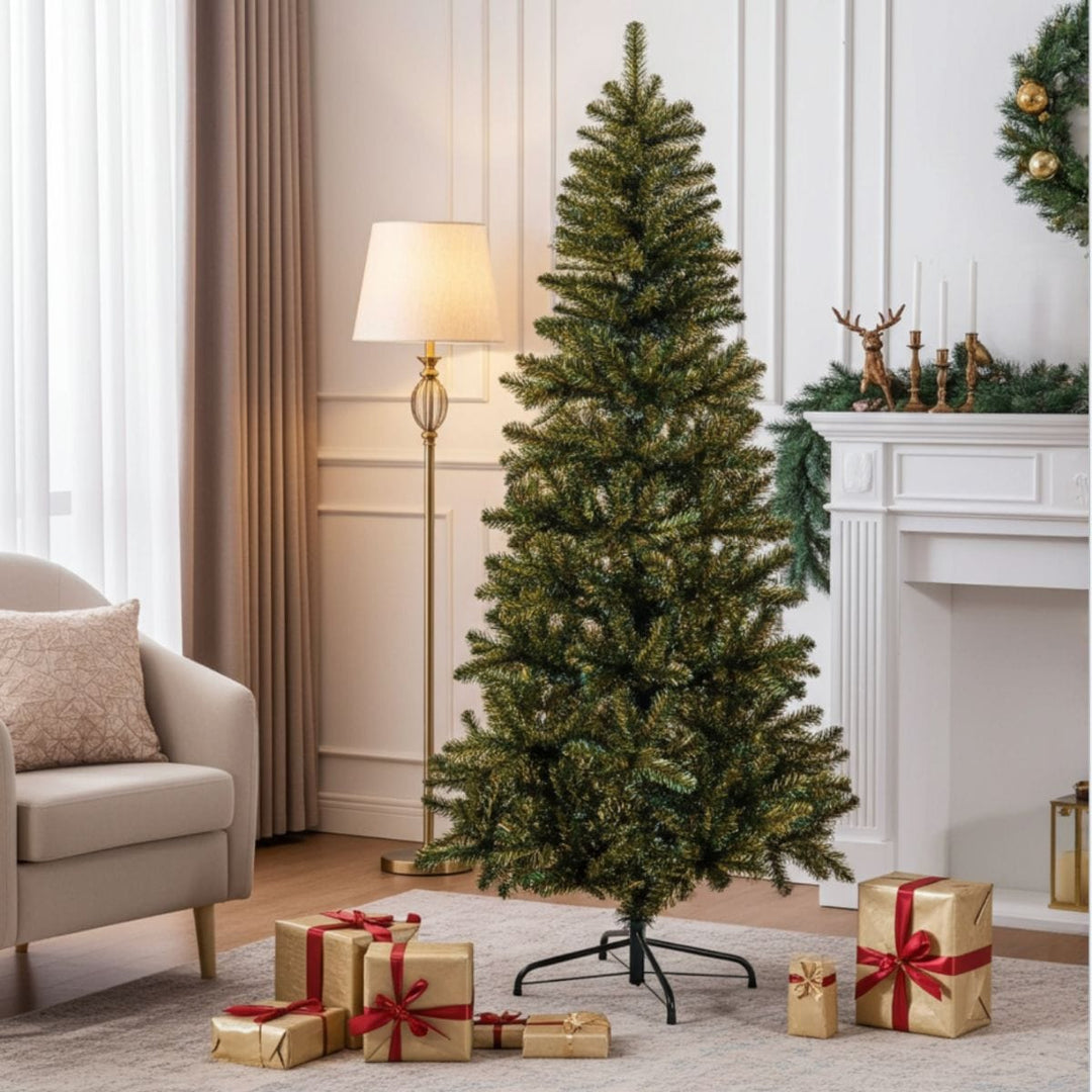 Decorative Christmas tree with presents in a living room setting.