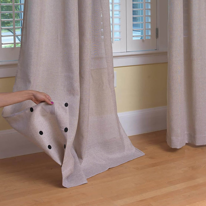 Velcro pads on the base of grey curtains