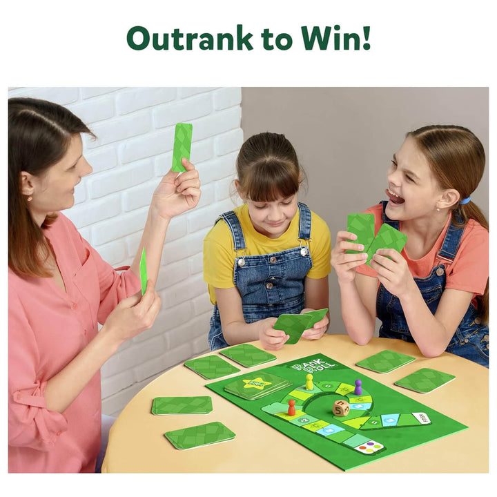 Adult and 2 children playing Rank & Roll board game