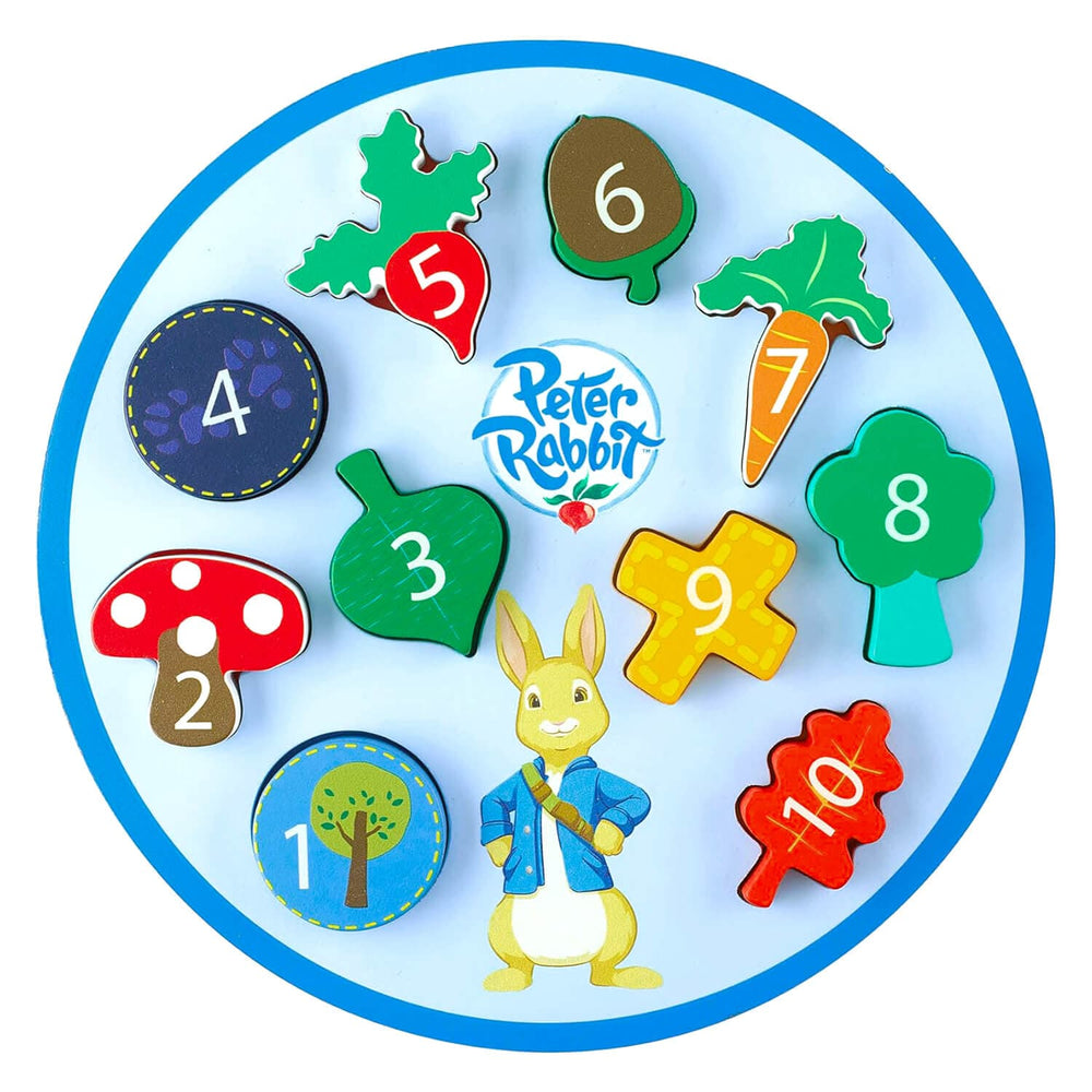 round shape sorter puzzle with peter rabbit design, leaf, vegetables and toadstool design and numbered pieces