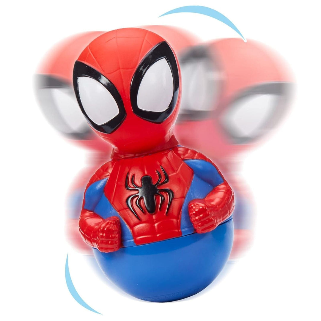 Toy figure of Spider-Man in red and blue costume with a blurred background to highlight movement