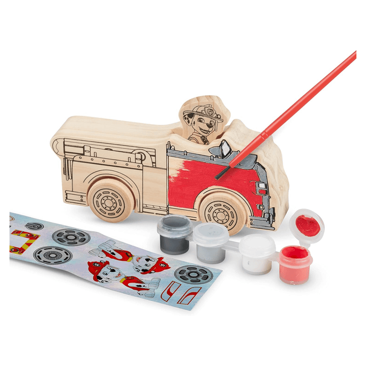 4 tubs of paints, stickers and paint brush beside wooden block half painted red