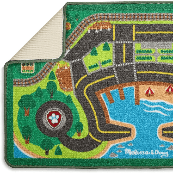 activity rug with corner folded over to show slip resitant backing and reinforced borders to prevent fraying