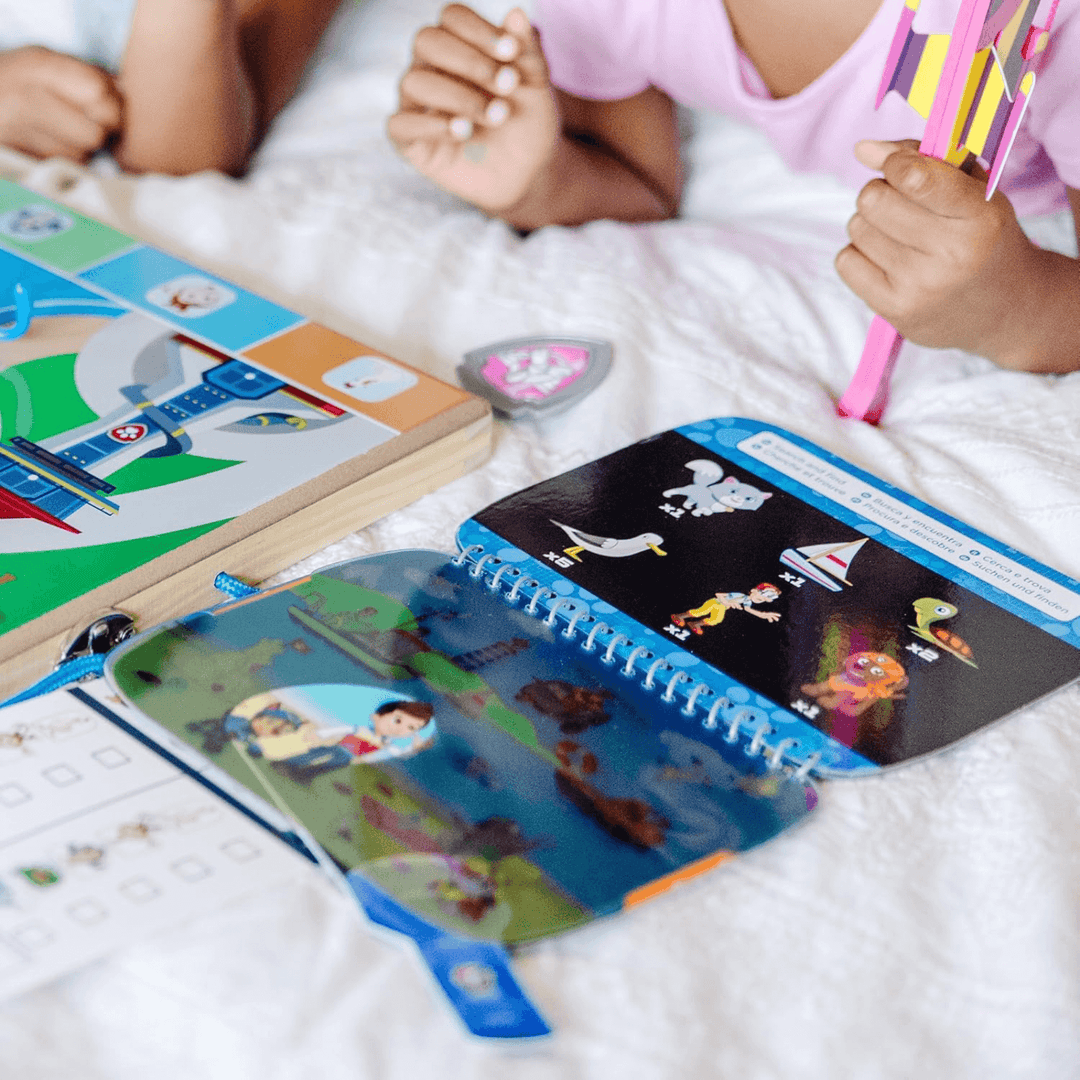 close up shot of search and find activity book on bed