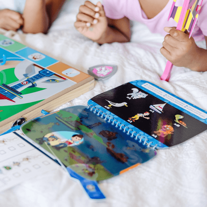 close up shot of search and find activity book on bed
