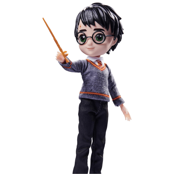 harry potter figure posing with wand, wearing hogwarts uniform