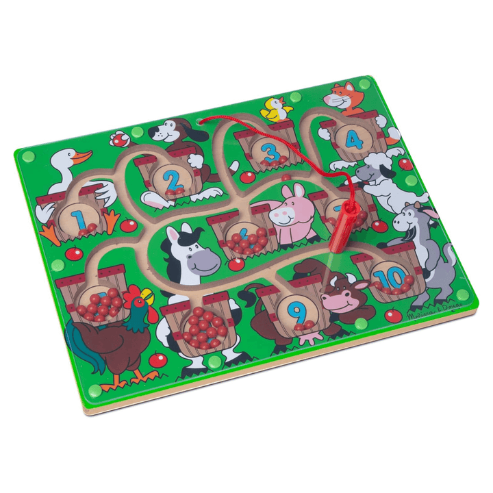 puzzle board on white background with red magnetic wand on string 