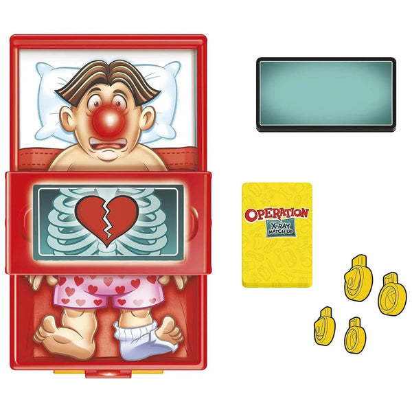 Box contents of Operation X-ray match up game with scanner, x-ray cards, 4 wheels and ailment cards