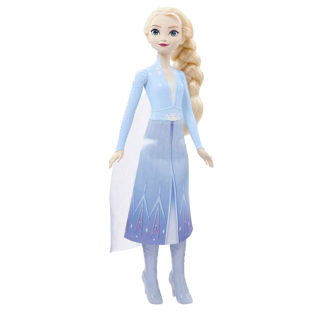 Disney Frozen Elsa fashion doll wearing blue travel outfit with boots and cape