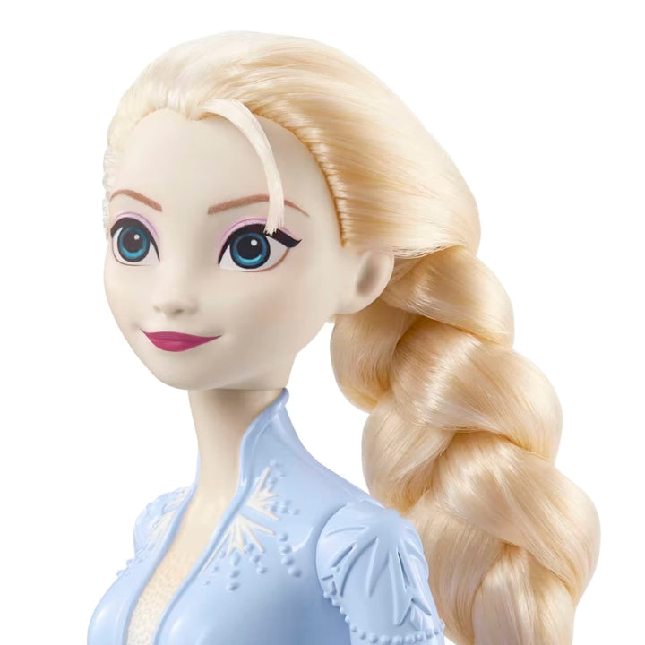 Close up of the face and braided hair of a Disney Frozen Elsa fashion doll