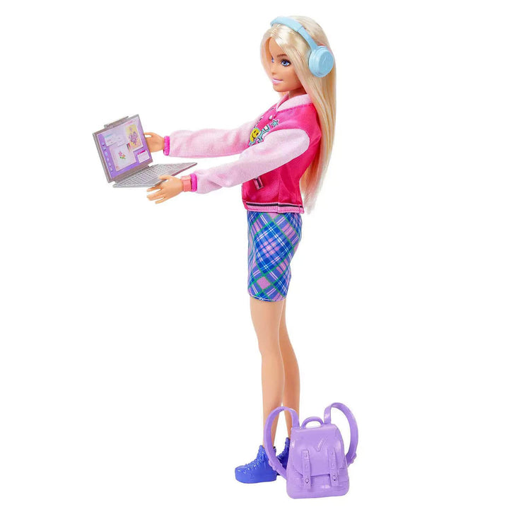 Barbie I love school fashion doll holding a laptop