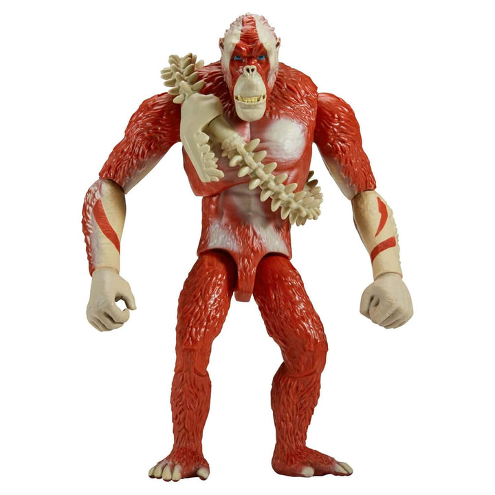 Red and white Skar King action figure with a spine-like object on a white background